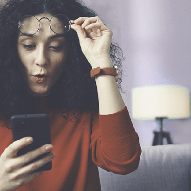 Woman looking at smartphone