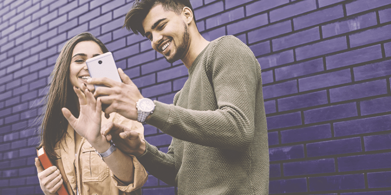 Users looking at smartphone