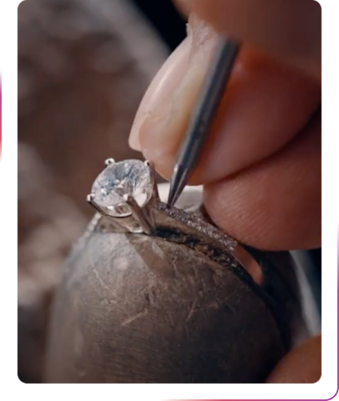 a jeweler making a ring