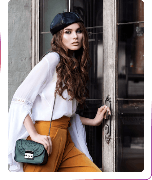 young fashion girl posing next to the door