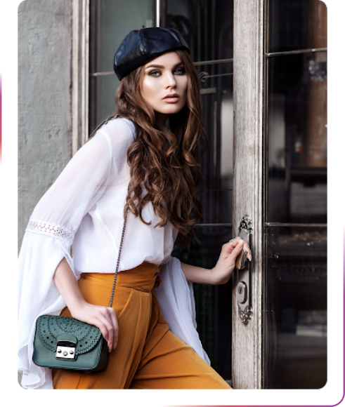 young fashion girl posing next to the door