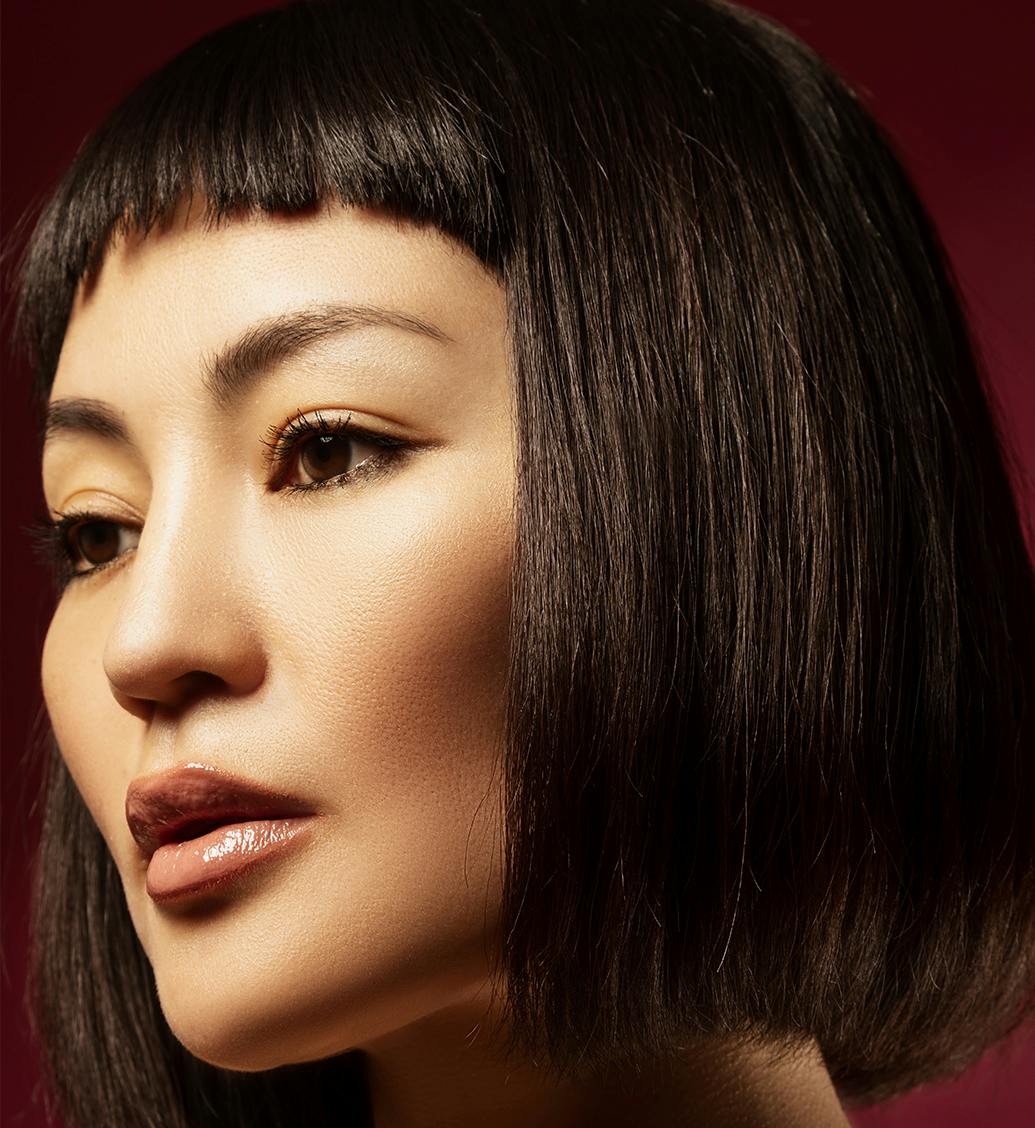 Woman with short hair and bangs