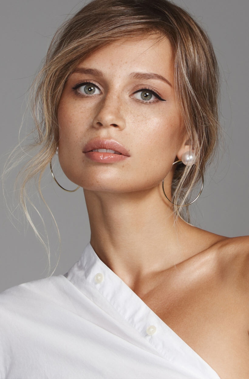 Blonde woman with  hoop earrings
