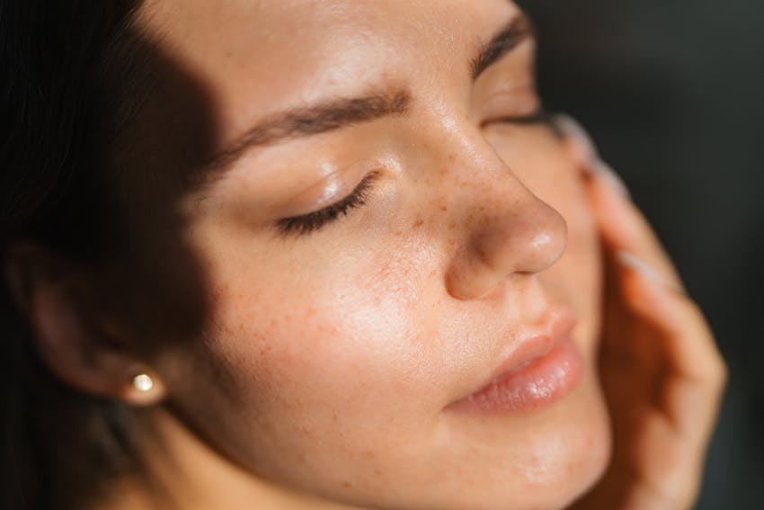 close up of woman with freckles