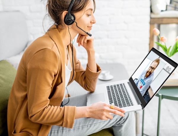 Peninsula Group Limited - Two employees catching up over a video chat