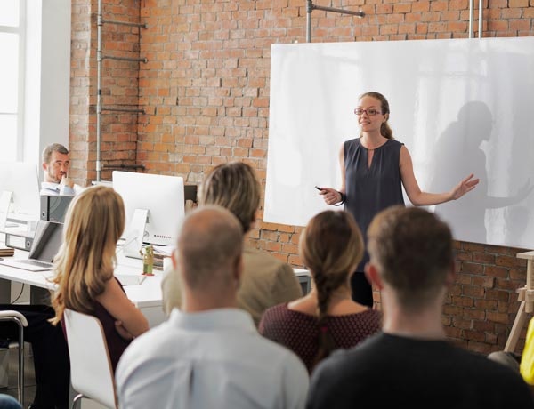 Peninsula Group Limited - An expert providing mental health training to a group of employees