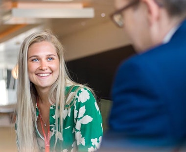 Peninsula Group Limited - An employee discussing their wellbeing with their line manager