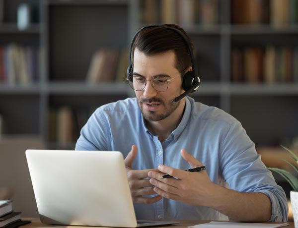 Peninsula Group Limited - An employee discussing their wellbeing on a video call