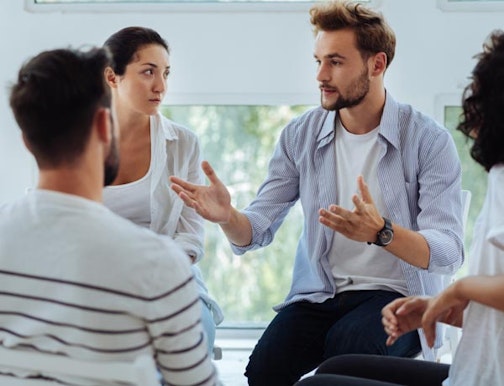 Peninsula Group Limited - Someone conducting mental health first aid training to a group of managers