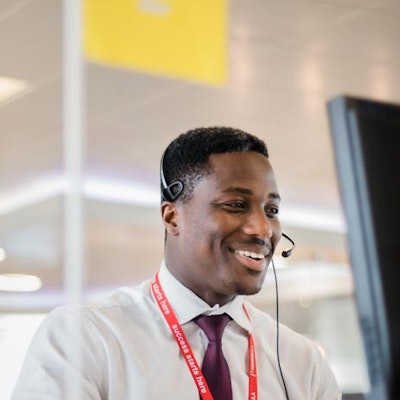 Peninsula Group Limited - A Peninsula advisor smiling as he provides quality HR advice and support