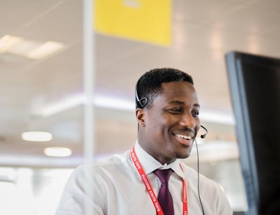 Peninsula Group Limited - A Peninsula advisor smiling as he provides quality HR advice and support