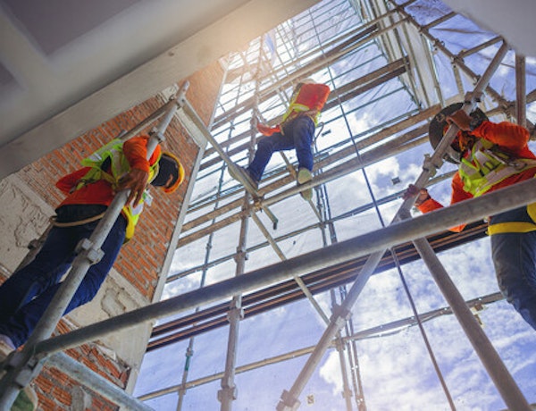 Peninsula Group Limited - Three construction workers climbing on scaffolding