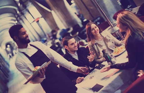 People enjoying a meal around a table