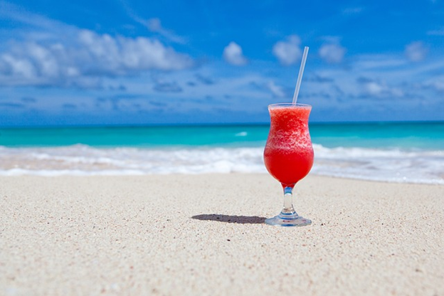 Cold drink on a beach.
