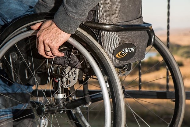 A disabled employee using a wheelchair.