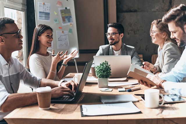 A group of people having a meeting