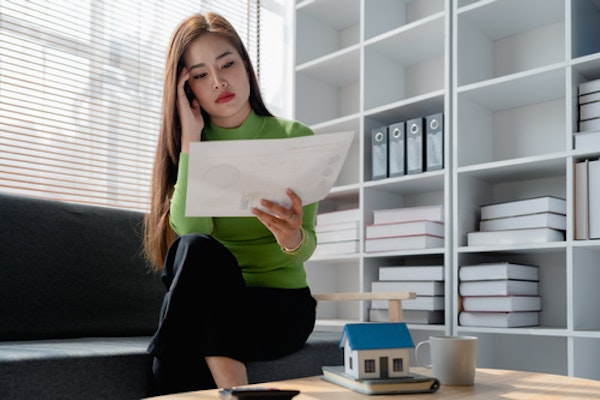 A woman looking at documents