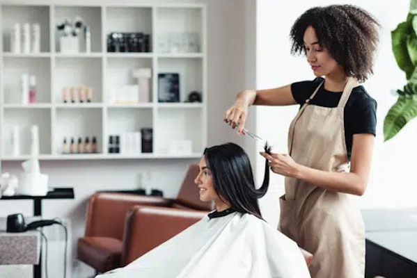 Someone working in a salon.