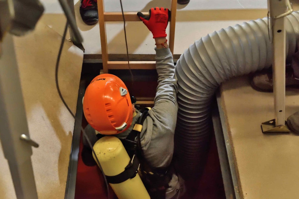 a man working in a confined space