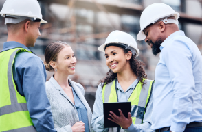 construction workers in high vis jackets and helmets