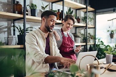 people in florist shop working