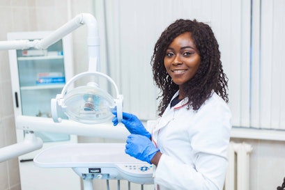 Female dental technician in office