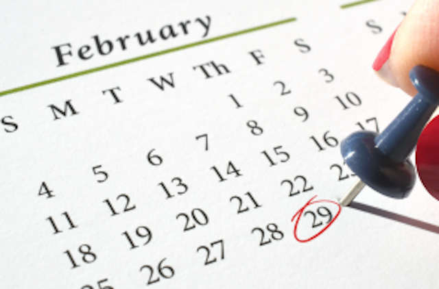 calendar on february month with person circling the 29th day