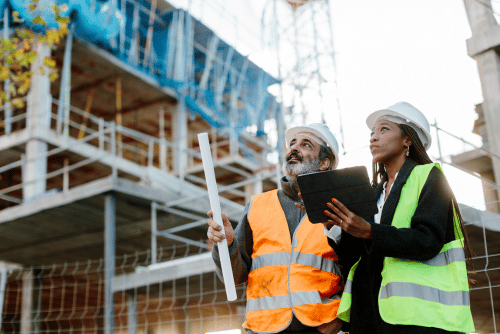 male and female construction workers