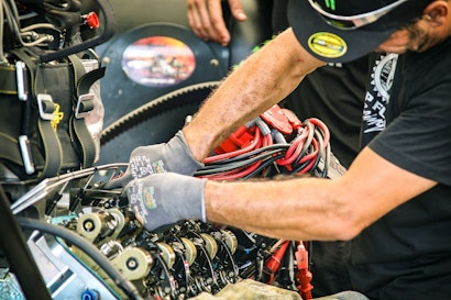 Mechanic fixing car
