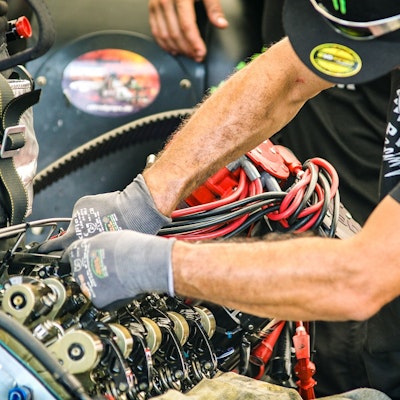 Mechanic fixing car