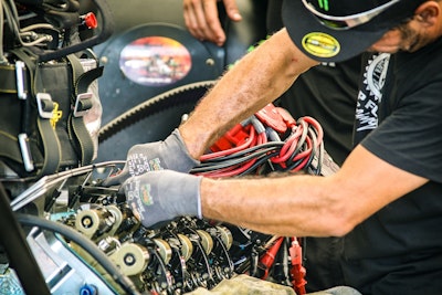 Mechanic fixing car