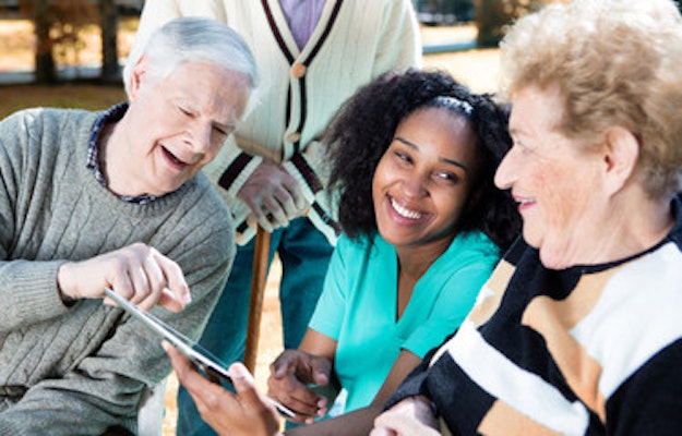 A care regulator with elderly people