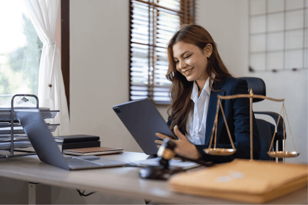 HR Management Software - An employer happily using Peninsula's HR Management Software.