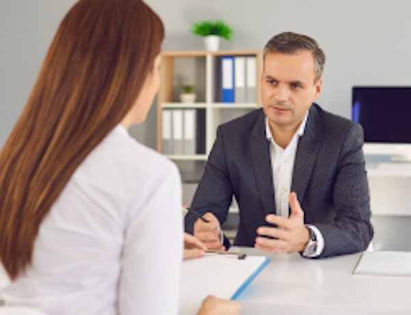Health & Safety Consultants - An employer discussing a case with a H&S consultant.