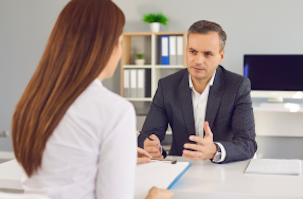 Health & Safety Consultants - An employer discussing a case with a H&S consultant.