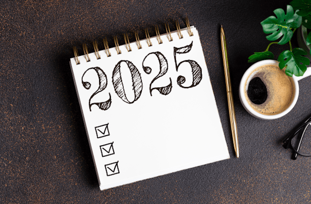 2025 calendar with cup of coffee next to it