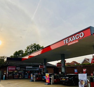 A petrol forecourt.