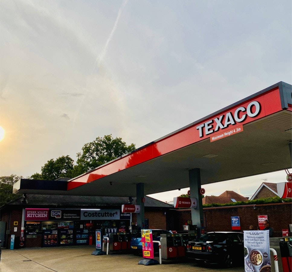 A petrol forecourt.