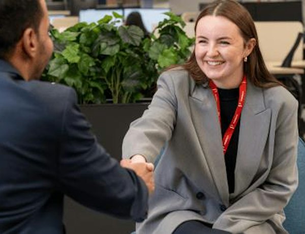 shaking hands with a collegue