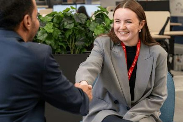 shaking hands with  a collegue