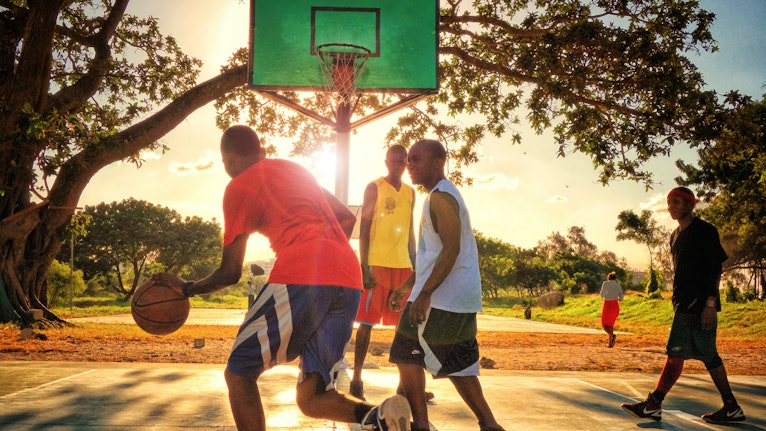 Rising Above. How compassion, tenacity and investment, help Africa’s basketball stars hit the heights.