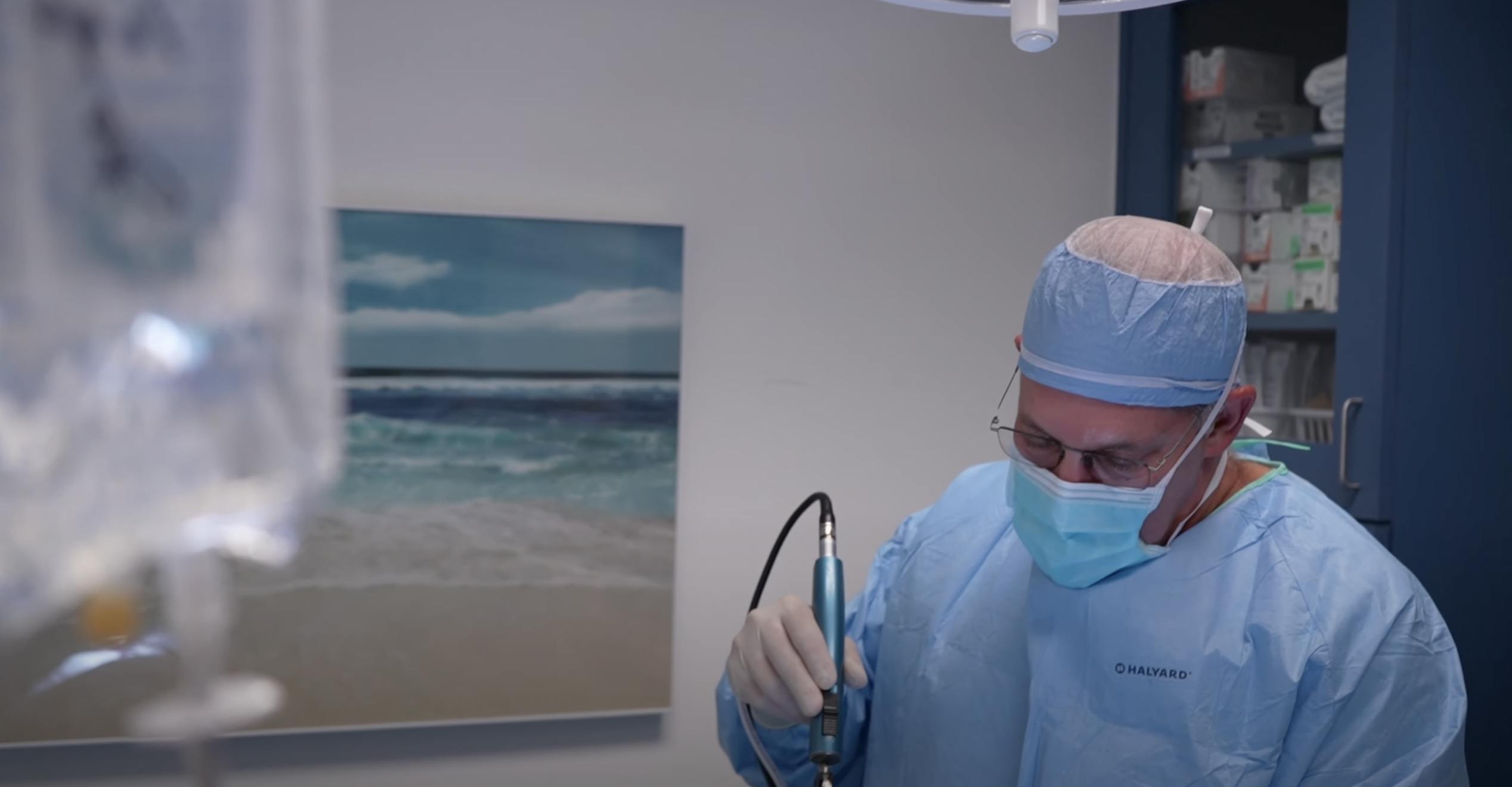 Dr. Beck performing chin liposuction