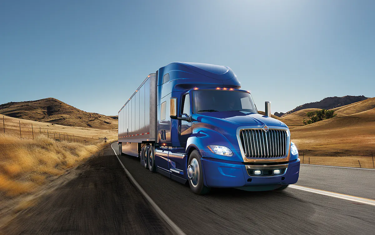 Blue LT Truck on highway in dessert