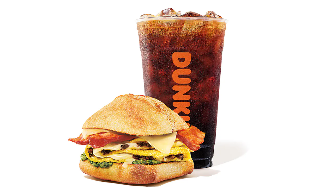 Dunkin' Donuts large iced beverage with a breakfast sandwich