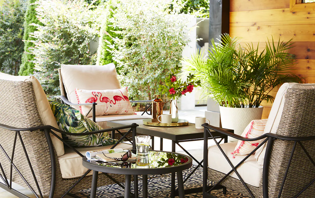 Lowe's outdoor patio furniture surrounded by greenery