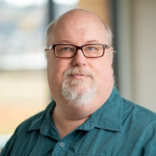 Headshot of Chris Newell.