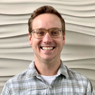 Headshot of Andrew Howe.