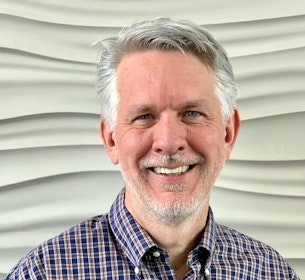 Headshot of Dennis Schneider.