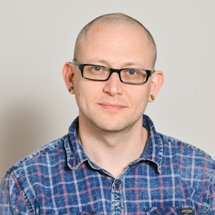 Headshot of Micah Shlain.