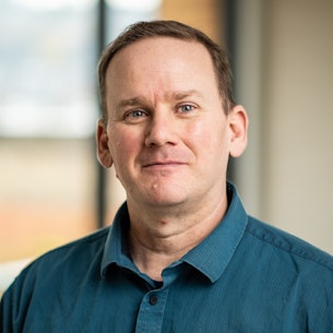Headshot of Darrell Plessas.